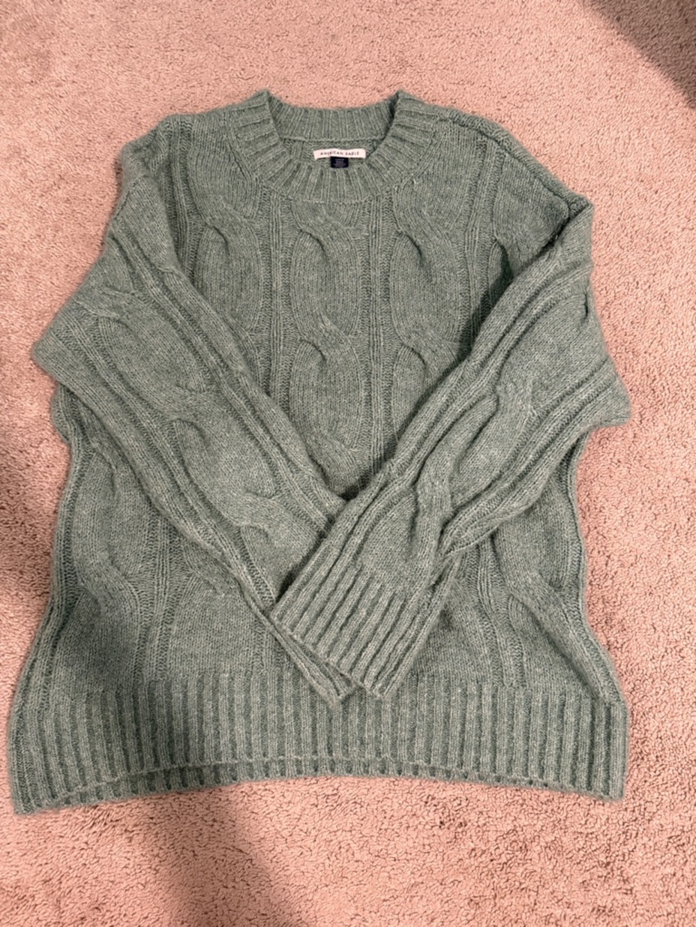 American Eagle Outfitters Sage Green Cable Knit Crewneck Sweater is oversized